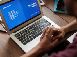 person in front of his laptop