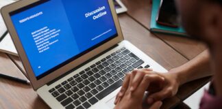 person in front of his laptop