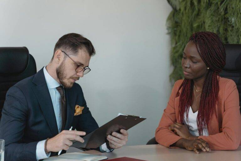 man reviewing woman s resume
