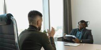 businessman looking at employee