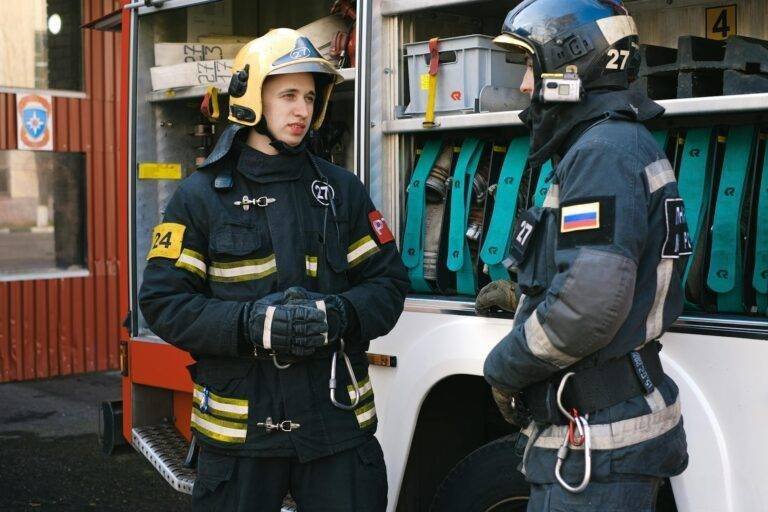 firefighters having a conversation while standing