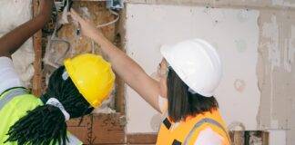 female engineers inspecting a demolished wall