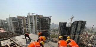 workers at construction site in city