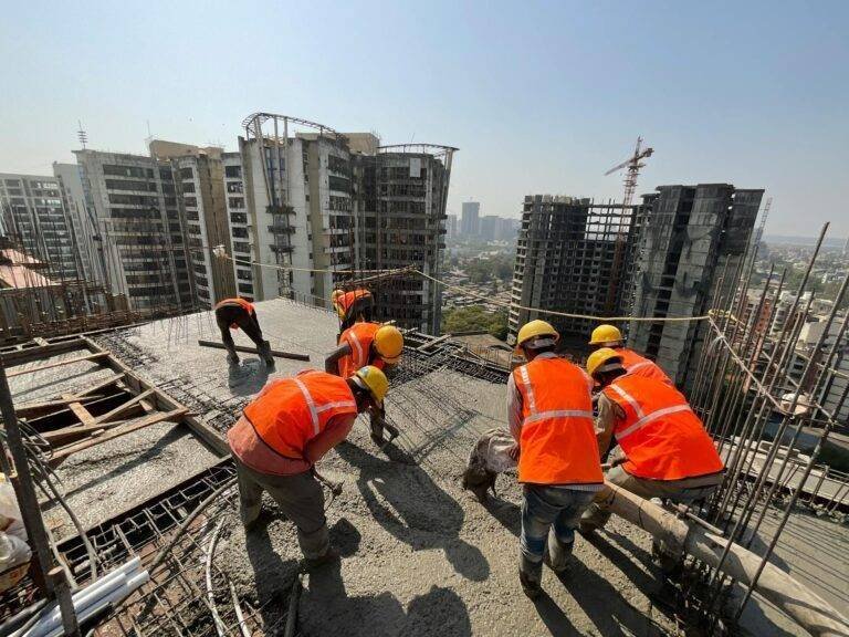 workers at construction site in city