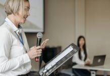 a woman holding a microphone