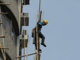 builder working on a scaffolding