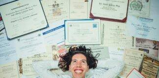 man lying on certificates