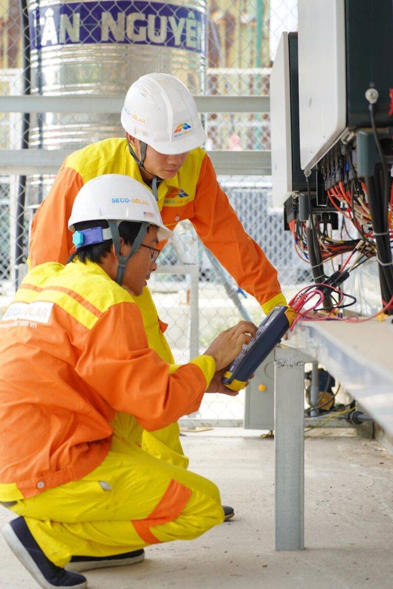 men working wearing hardhats and uniforms