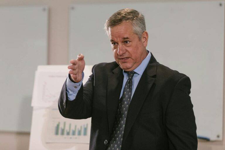 a speaker in a formal wear