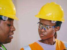 woman in yellow hardhat