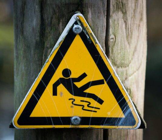 sign slippery wet caution