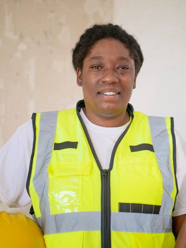 close up photo of woman in reflective vest