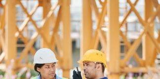 man and woman working in a construction site
